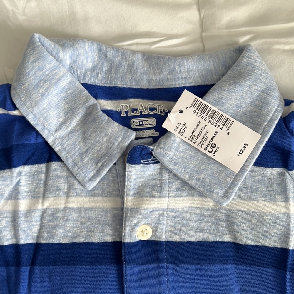 New, with tag polo size L (10-12) boys